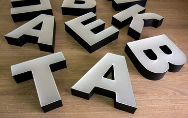 Three-dimensional light letters made of acrylic for advertising.Production of a logo for the...