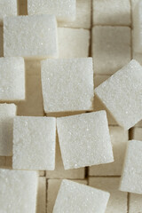 Cubes of white crystalline beetroot refined sugar.