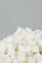 Cubes of white crystalline beetroot refined sugar.