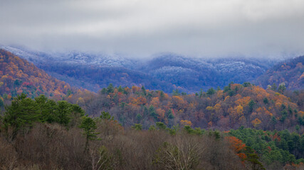 Smokey mountains in autumn with snow on peaks