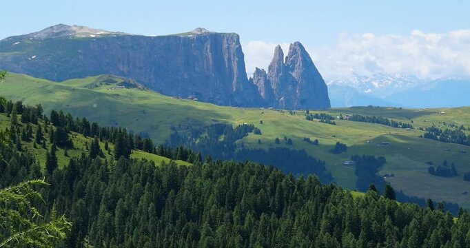 Panorama of Alpe Di Siusi near Seis Am Schlern and Compatsch with a view on Monte Pez on summer, Dolomites Mountains, Italy