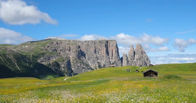 Panorama of Alpe Di Siusi near Seis Am Schlern and Compatsch with a view on Monte Pez on summer, Dolomites Mountains, Italy