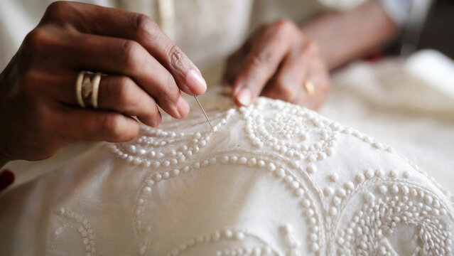 Chikankari Embroidery in Progress with Ringed Hand