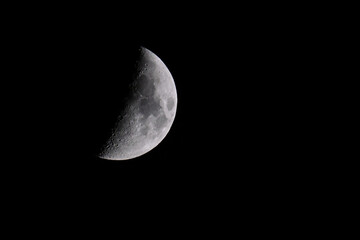 Waxing gibbous moon in the night.