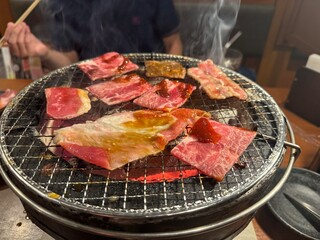 The meat on the grill