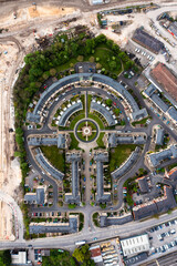 Aerial view directly above a new build housing estate in the UK with circular design