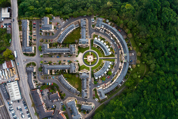 Aerial view directly above a new build housing estate in the UK with circular design