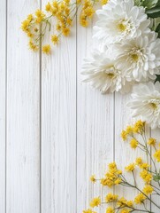 Fototapeta premium white chrysanthemum and yellow coltsfoot on white wooden background