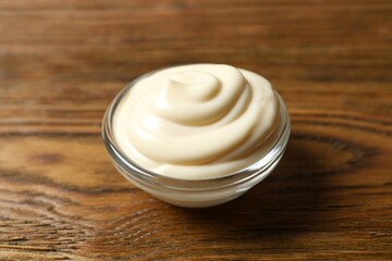 Bowl with mayonnaise on the table