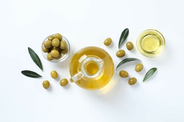 Bottle of fresh olive oil and olives with leaves on white background
