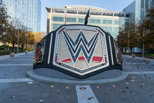A sculpture of a championship belt in front of the offices of WWE on Washington Boulevard in Stamford, Connecticut, on November 7, 2023. WWE is an American professional wrestling promotion.