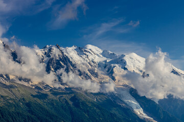 Mont Blanc, Monte Bianco mountain summit in the Alps. The highest mountain in Europe. Snow and glacier covered high altitude snow mountain in the Alps. The top of Montblanc Chamonix valley landscape