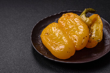 Yellow sweet pepper cut in half and grilled with salt, spices and herbs