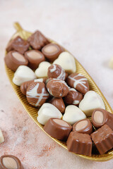 Handmade chocolate with pistachios, dark and milk chocolate pieces.