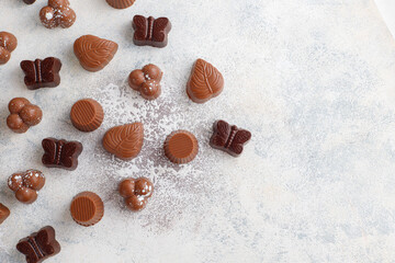 Handmade chocolate with pistachios, dark and milk chocolate pieces.
