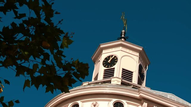 Detail of the clock tower on the roof found in European buildings