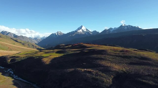 Aerial view of surrounded snow-capped Himalayan mountains at chandratal in lahaul and spiti valley himachal pradesh, India.
