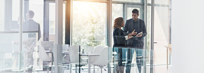 Business people, discussion and meeting with tablet for planning, project or proposal in boardroom....
