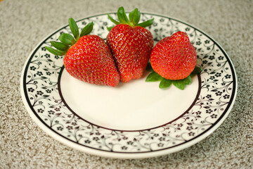 Strawberries on an Elegant Round Plate