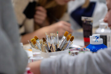 A Creative Gathering: A Girls Group Art Session with Brushes in Focus