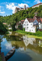 Obraz premium Harburg is a village in the Wornitz River valley, Germany, with one of the most beautiful and best-preserved castles.