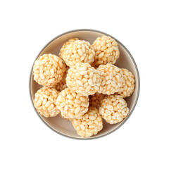 Delicious puffed rice balls in bowl isolated on white, top view
