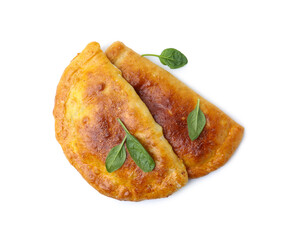 Tasty calzones with basil isolated on white, top view