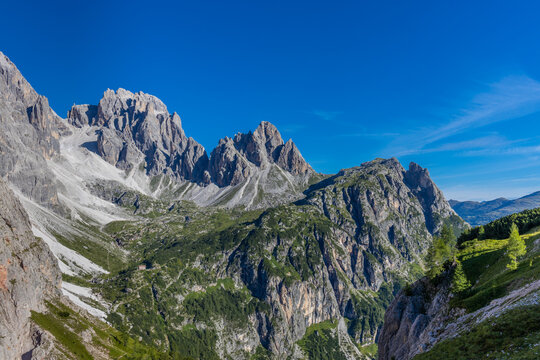 Monte Popera mountain summit in the Dolomites. Rocky mountain tower in the Alps, sunny summer day with blue sky in the Dolomiti Alps scenic landscape