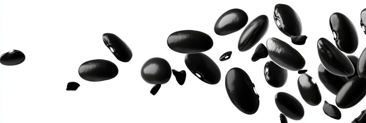 Isolated Black Beans Cascading Against a Crisp White Backdrop