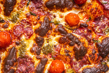 Pizza textured background. Pepperoni Pizza Close-Up. High quality photo