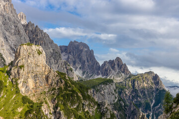 Obraz premium Monte Popera mountain summit in the Dolomites. Rocky mountain tower in the Alps, sunny summer day with blue sky in the Dolomiti Alps scenic landscape