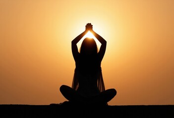 silhouette of a woman meditating