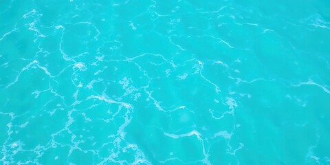Obraz premium Pure blue turquoise water texture of the ocean sea with foam and waves, turquoise, vibrant, sea