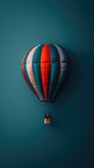Obraz premium A colorful hot air balloon against a solid backdrop, symbolizing adventure and leisure.