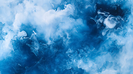 Blue acrylic ink swirling in water, creating a colorful explosion.
