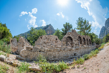 Fototapeta premium The ancient city of Olympos is a Lycian settlement located 10 km north of Tahtalı Mountain in Kumluca District, west of Antalya. It was founded as a Lycian port city. It is an important tourism locati