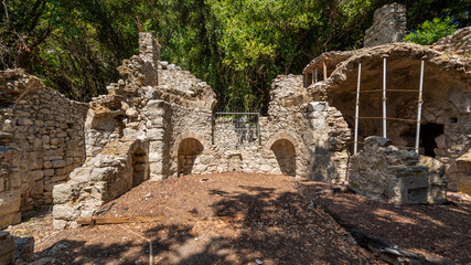 The ancient city of Olympos is a Lycian settlement located 10 km north of Tahtalı Mountain in Kumluca District, west of Antalya. It was founded as a Lycian port city. It is an important tourism locati