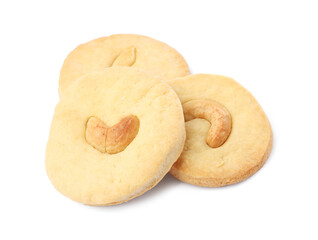 Three tasty cashew cookies isolated on white