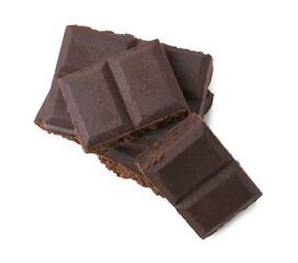 Pieces of delicious dark chocolate isolated on white, top view