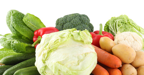 Many different ripe vegetables isolated on white