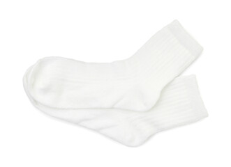 Pair of soft socks isolated on white, top view