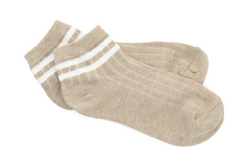 Pair of soft socks isolated on white, top view