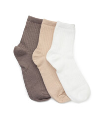 Pairs of soft socks isolated on white, top view