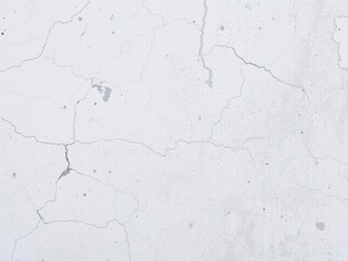 Obraz premium White concrete wall with rough textured surface and patches of plaster, background, rough, urban