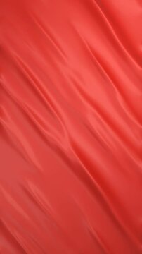 Animated waves on a red surface in a seamless loop 3d video. Silk like surface animated with waves