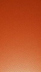 Fototapeta premium Vibrant Leather-Like Texture A Close-Up Exploration of Warm Orange Hues and Intricate Patterns