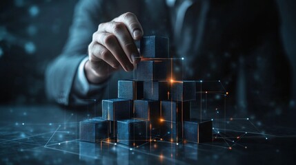 Businessman assembling digital blocks to represent growth in business development concepts