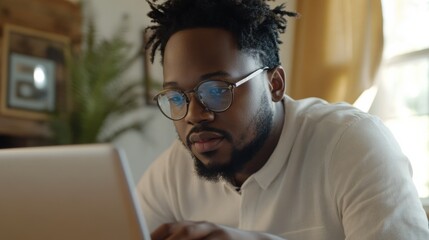 Remote worker focuses on digital art creation in collaborative workspace setting