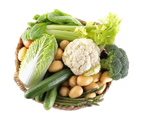Different ripe vegetables in basket isolated on white, top view