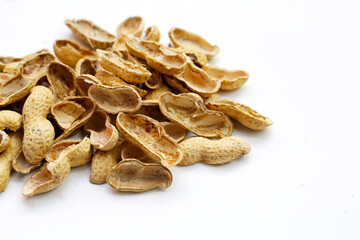 Peanut shells on white background.